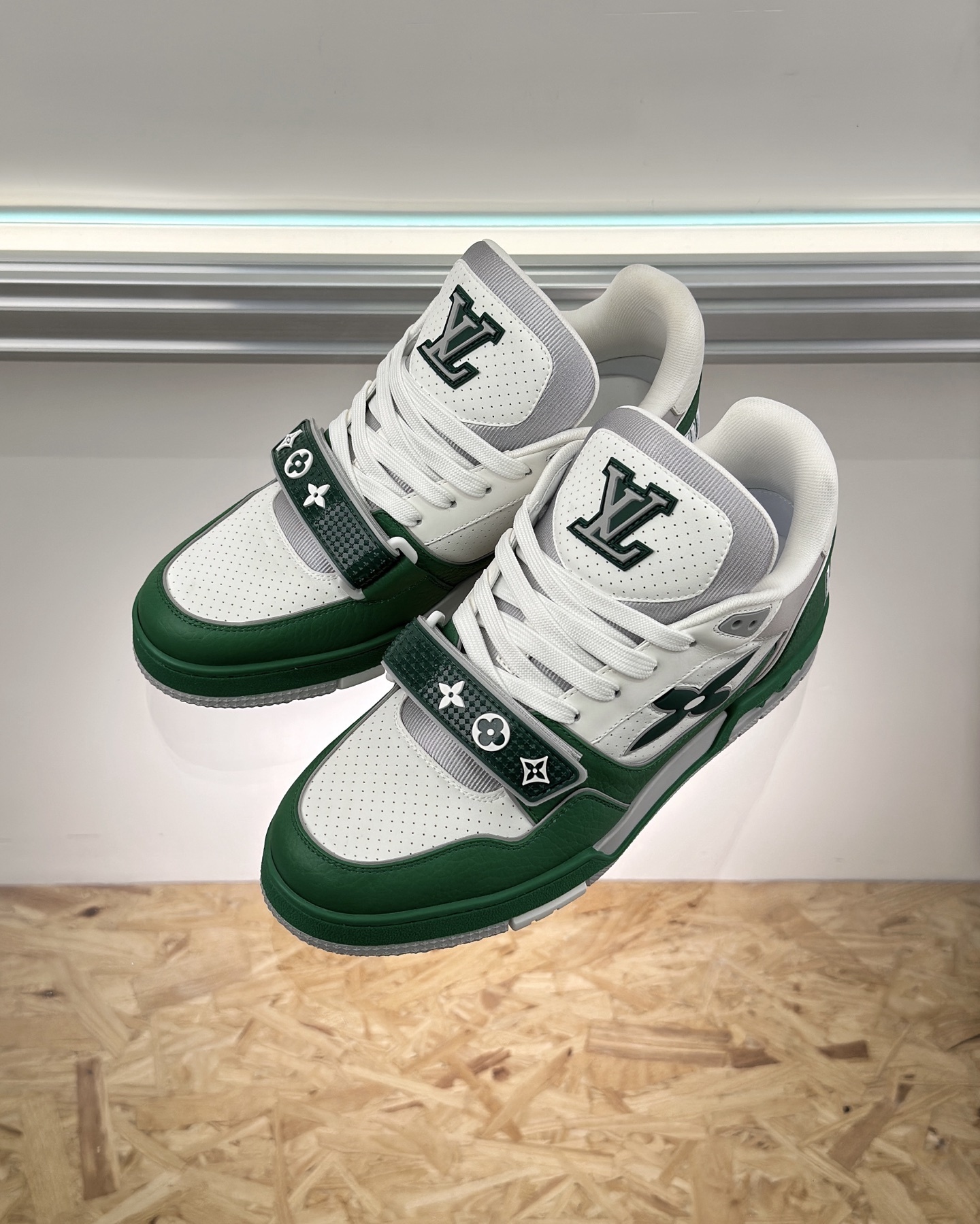 LV Trainer sneaker in white and green with a velcro strap