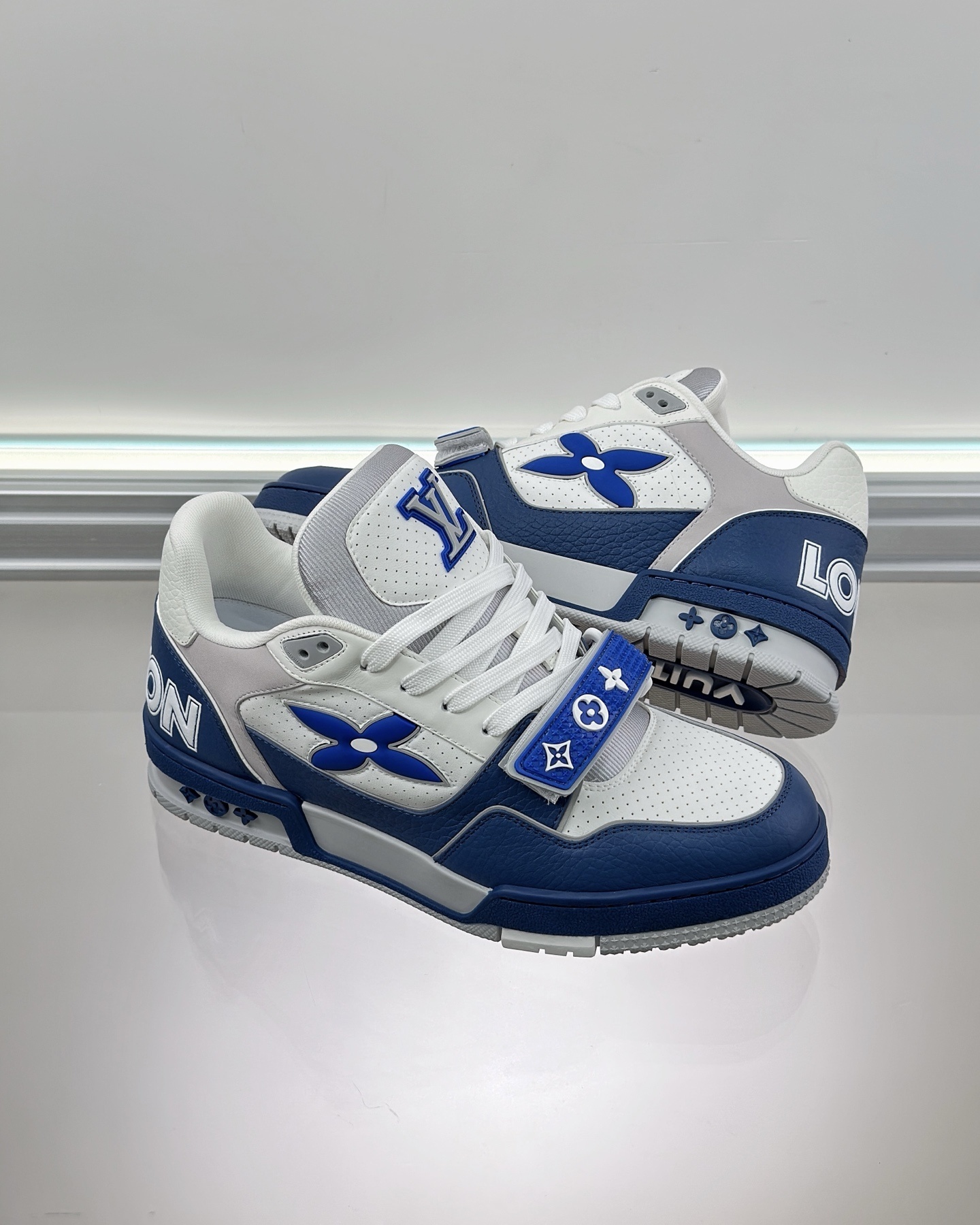 LV Trainer sneaker in a white and blue