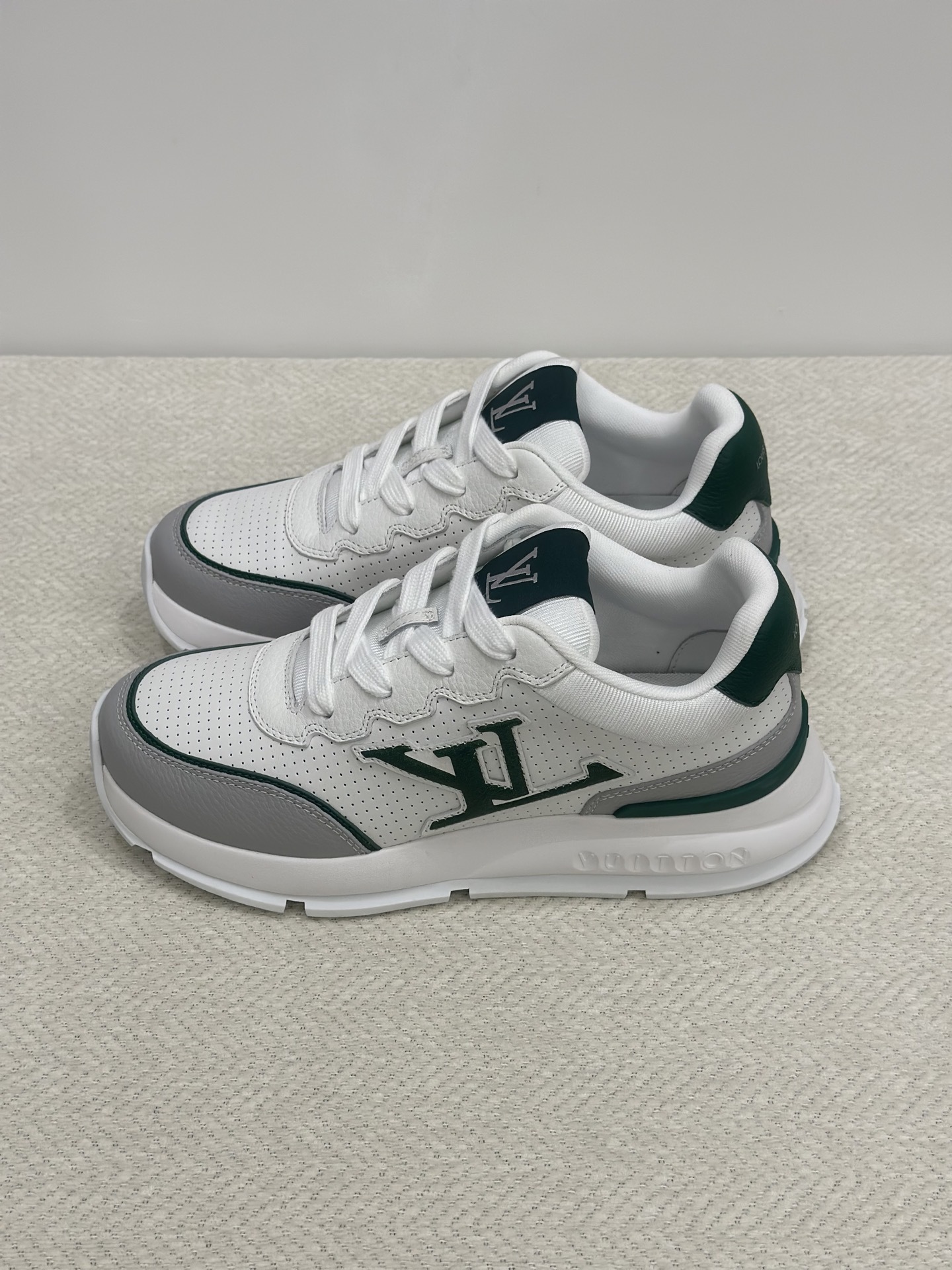 LV Classic sneaker in white and green calf leather