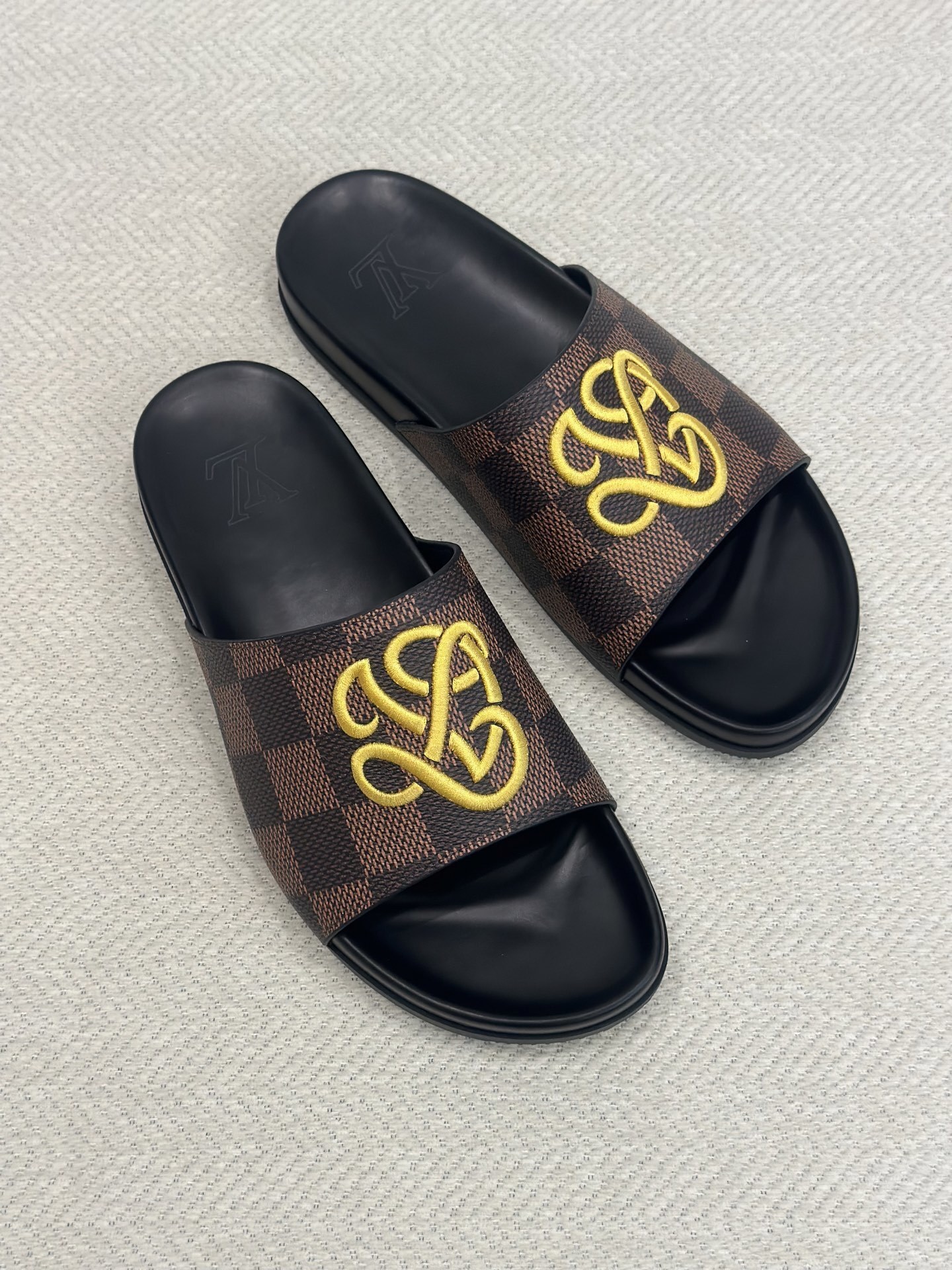 LV Palace Slipper in Damier grained calf leather in a brown