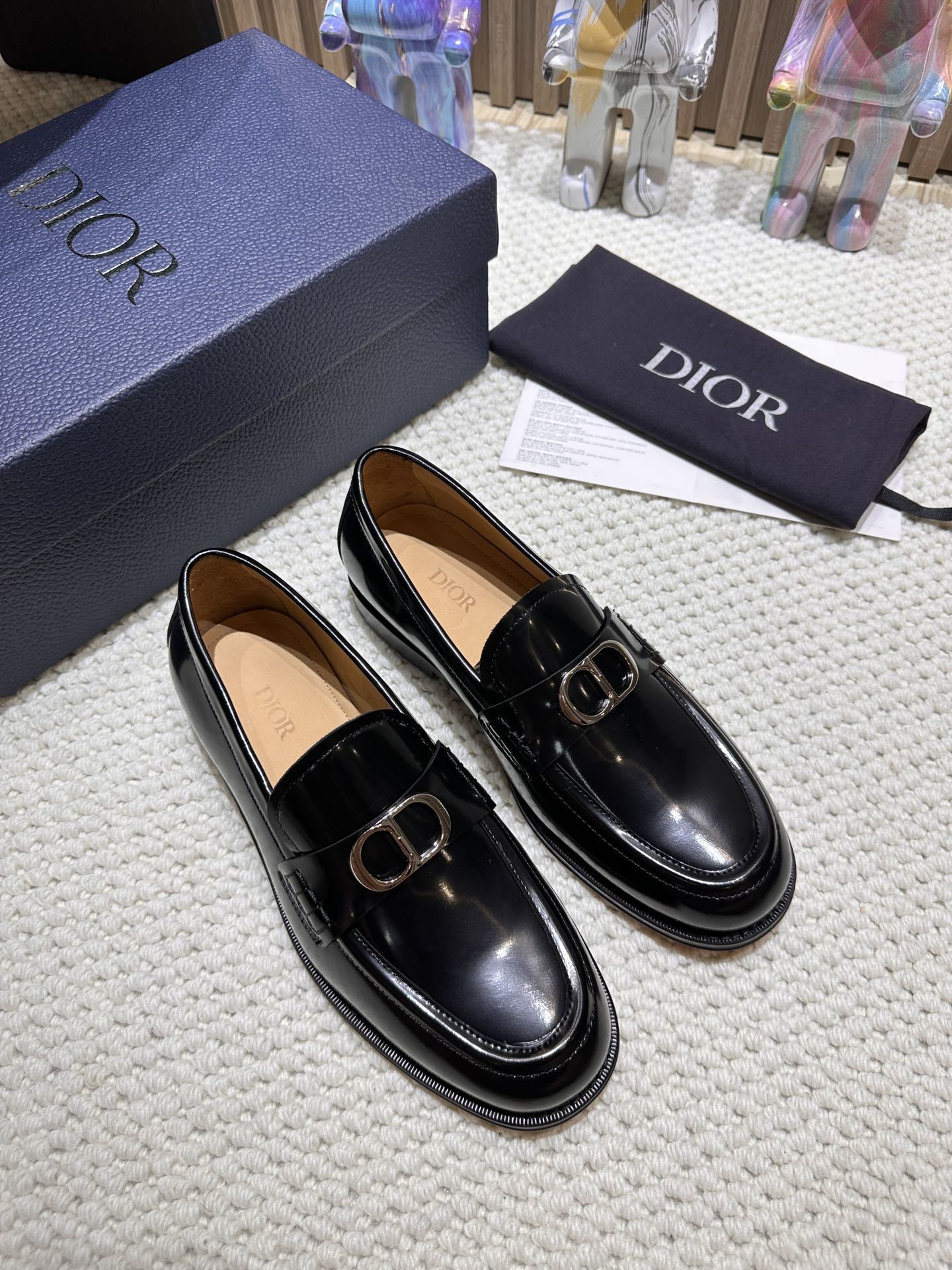 Dior Granville loafers in black polished calfskin with a palladium-finish brass CD Icon buckle
