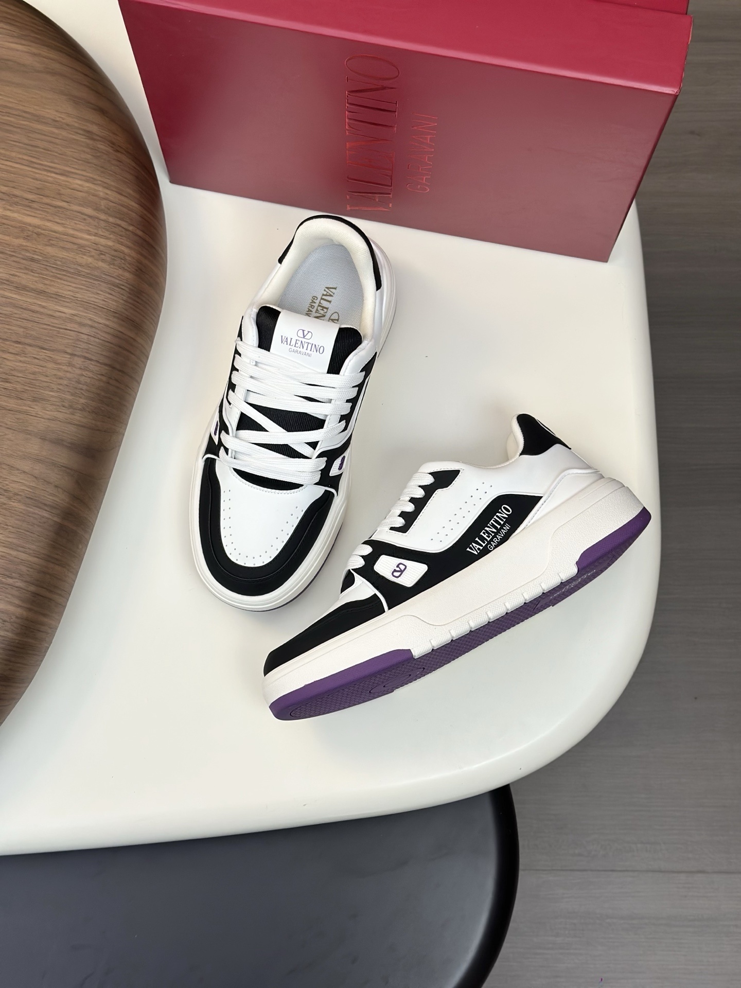 Valentino Garavani sneakers in white and black with a purple sole