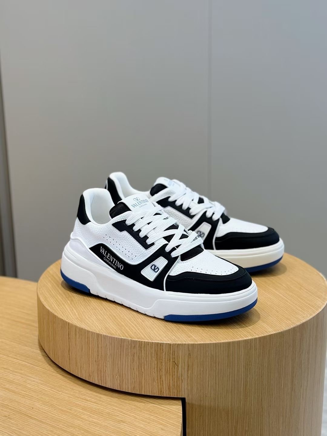 Valentino Garavani One Stud low-top sneakers in white and black