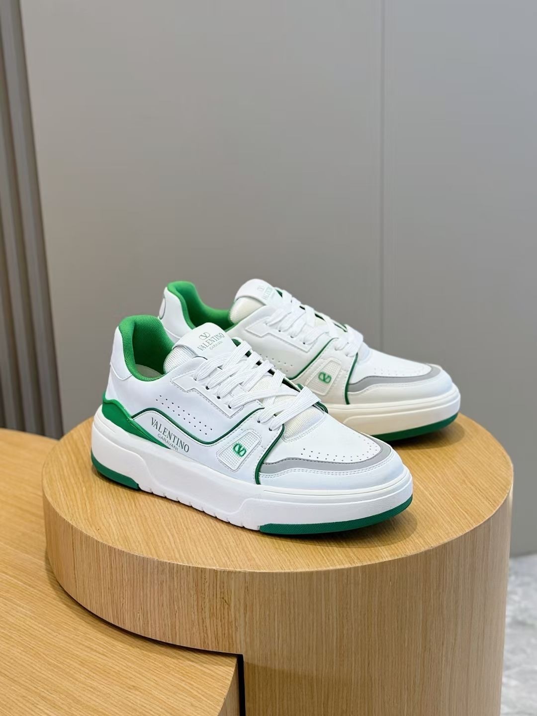 Valentino Garavani Upvillage Low-Top Trainers in white and green leather