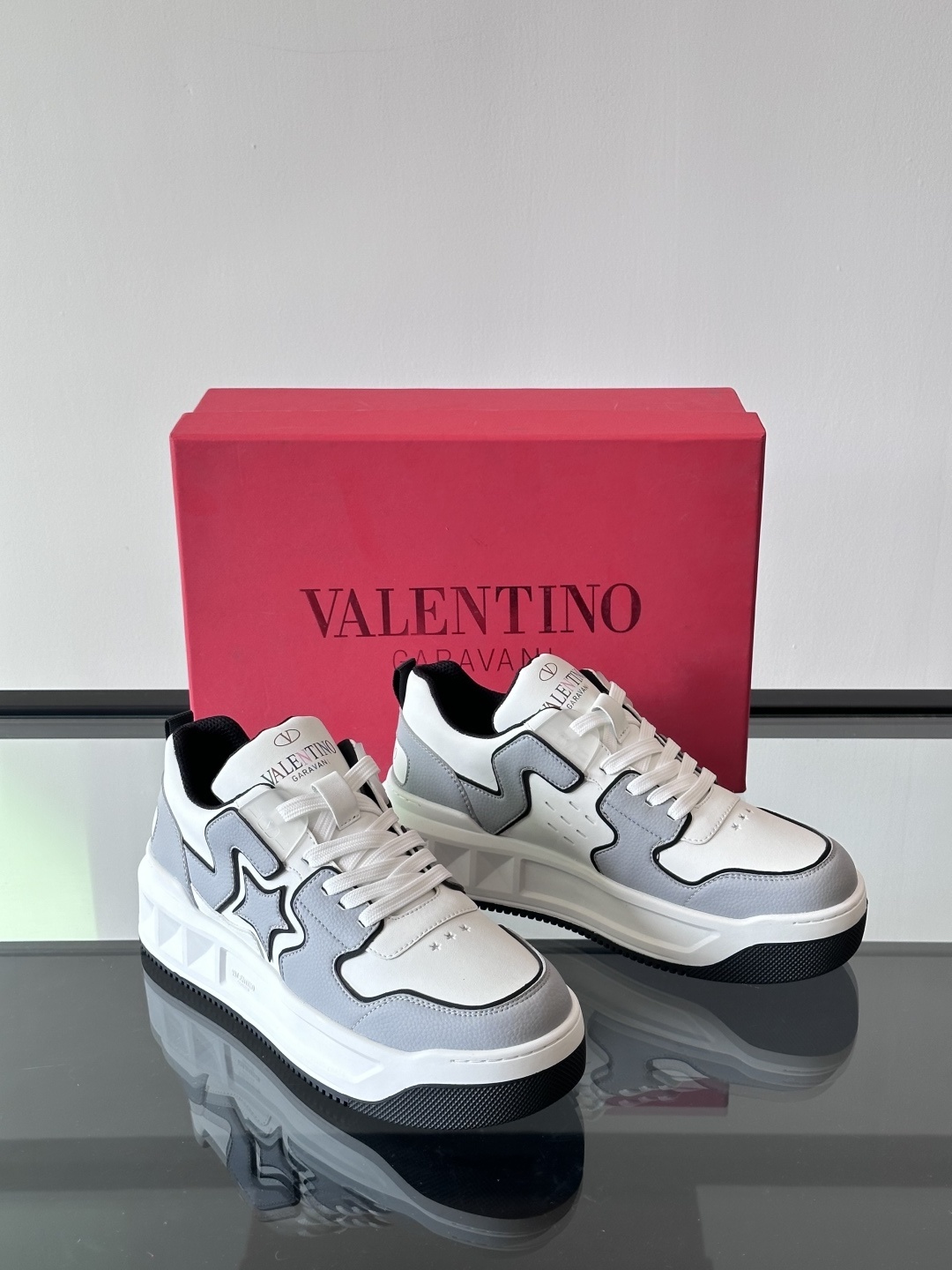 Valentino Garavani Upvillage low-top trainer in white and grey split leather and nappa calfskin