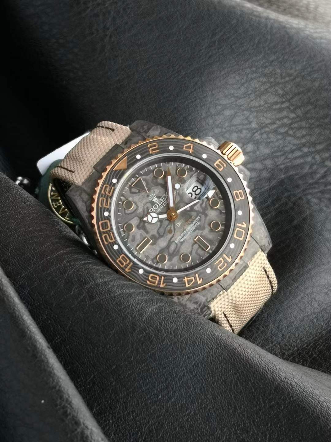 DiW (Designa Individual Watches) GMT-Master II 40mm watch with a carbon case, dial, and Everose gold accents