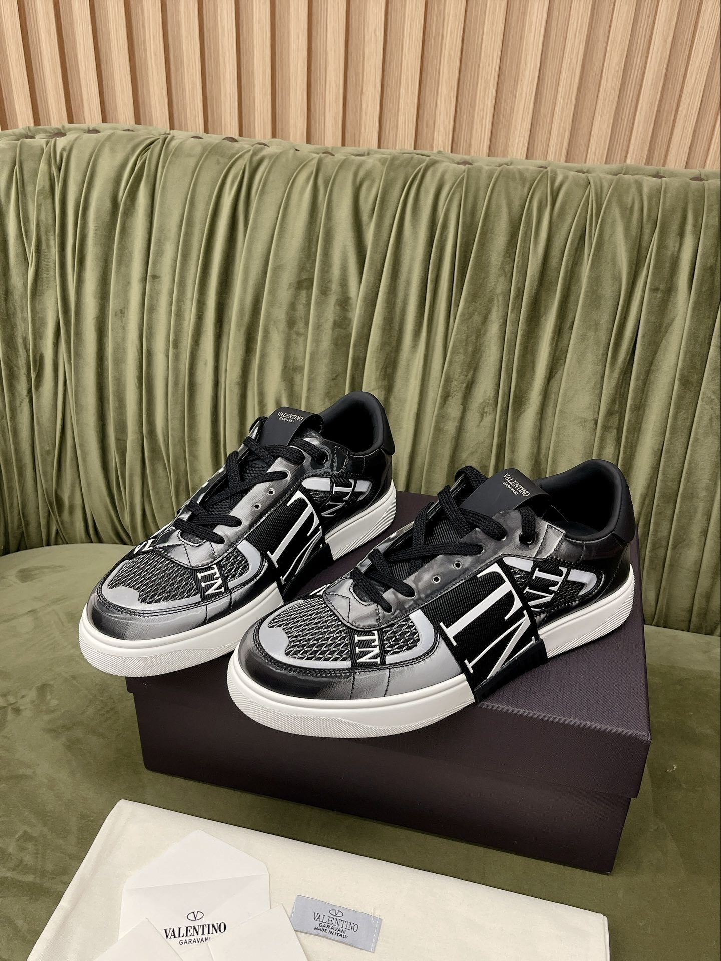 Valentino Garavani VL7N Low-Top Sneakers in black and white calfskin