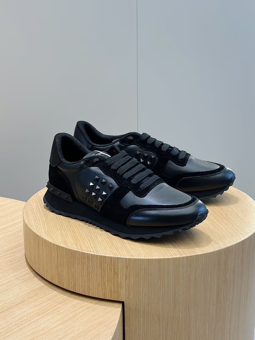 Valentino Garavani Rockrunner sneakers in black leather and suede with Rockstud accents
