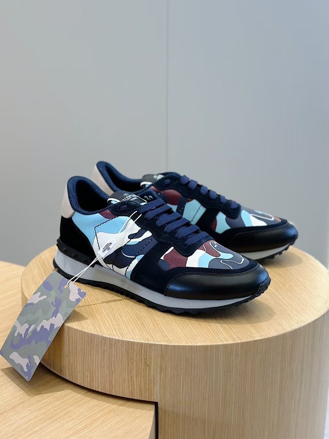 Valentino Garavani Rockrunner low-top sneaker in a blue and white camouflage print