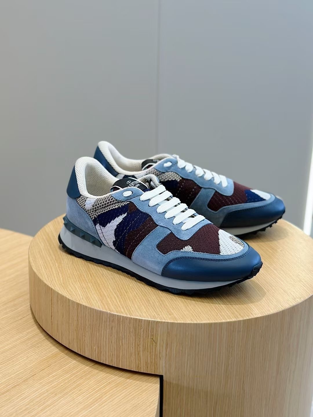 Valentino Garavani Camouflage Rockrunner sneakers in a burgundy and blue