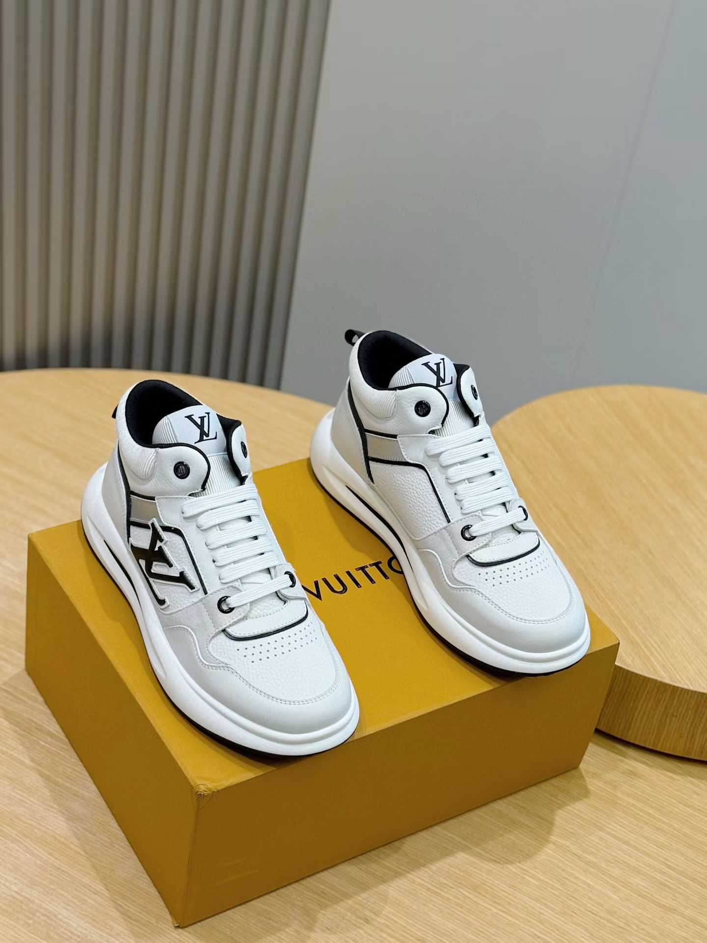 LV Trainer sneakers in white leather with black accents