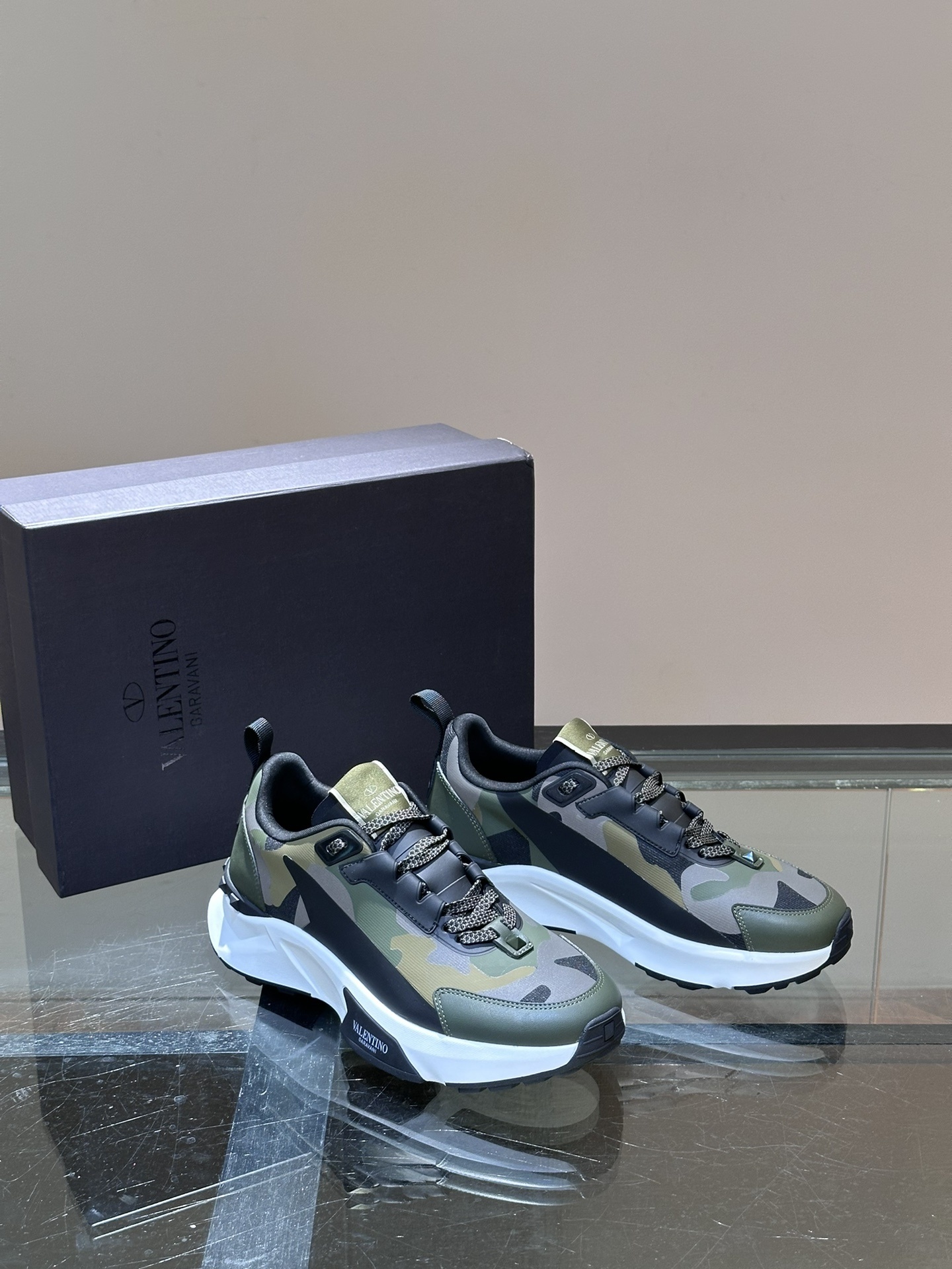 Valentino Garavani True Act techno fabric low-top sneakers in a camouflage pattern