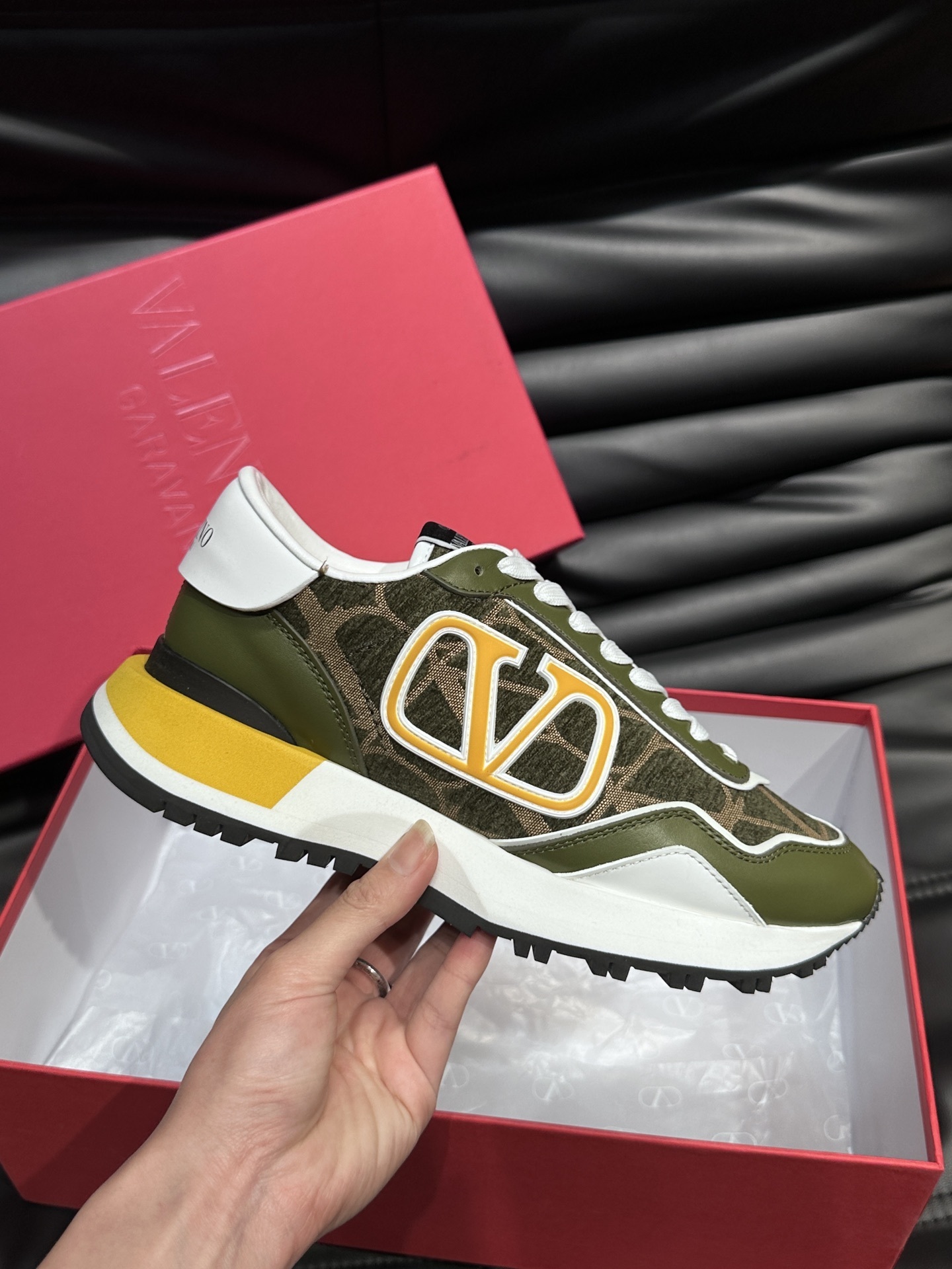 Valentino Garavani VLogo Pace low-top sneakers in a green and white color-block panelled design with a yellow VLogo signature.