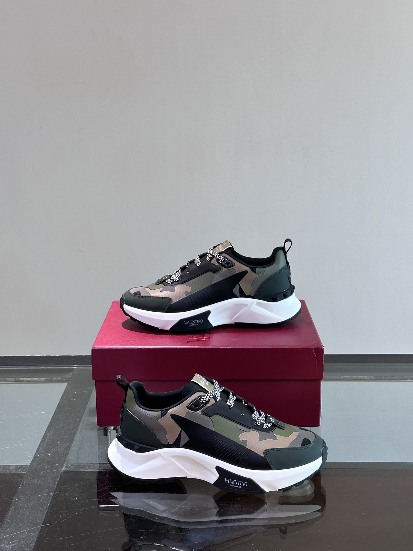 Valentino Garavani True Act techno fabric low-top sneakers in a camouflage pattern