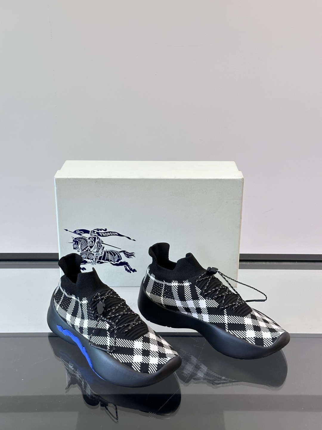 Burberry Check Knit Neptune sneakers in a black and white