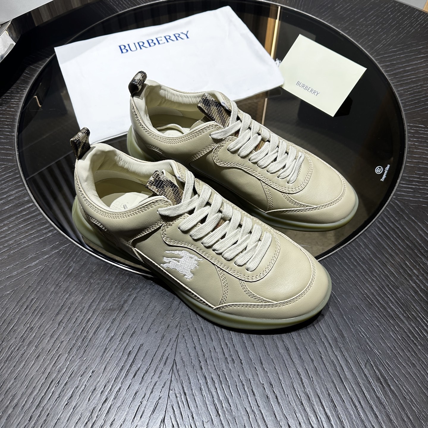 Burberry Leather Matrix sneakers in a beige or neutral color