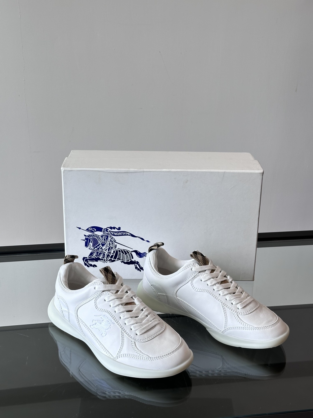 Burberry Matrix sneakers in white leather.