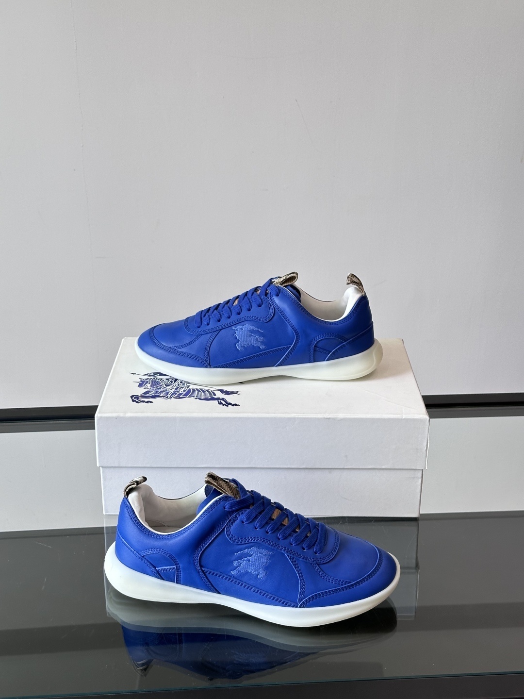 Burberry Leather Matrix sneakers in a vibrant blue