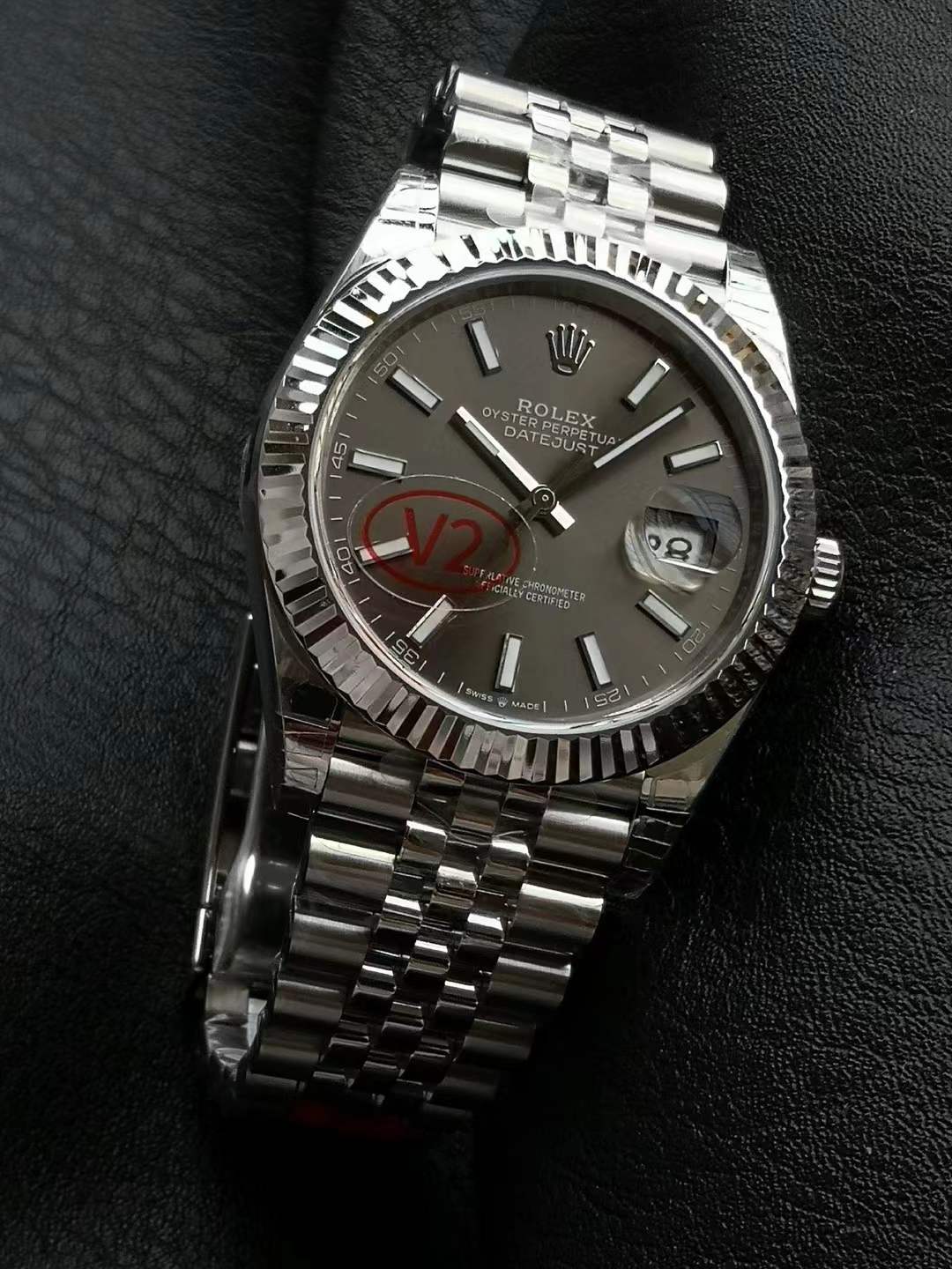 Rolex Datejust 41 with a fluted bezel, a grey dial, and a Jubilee bracelet