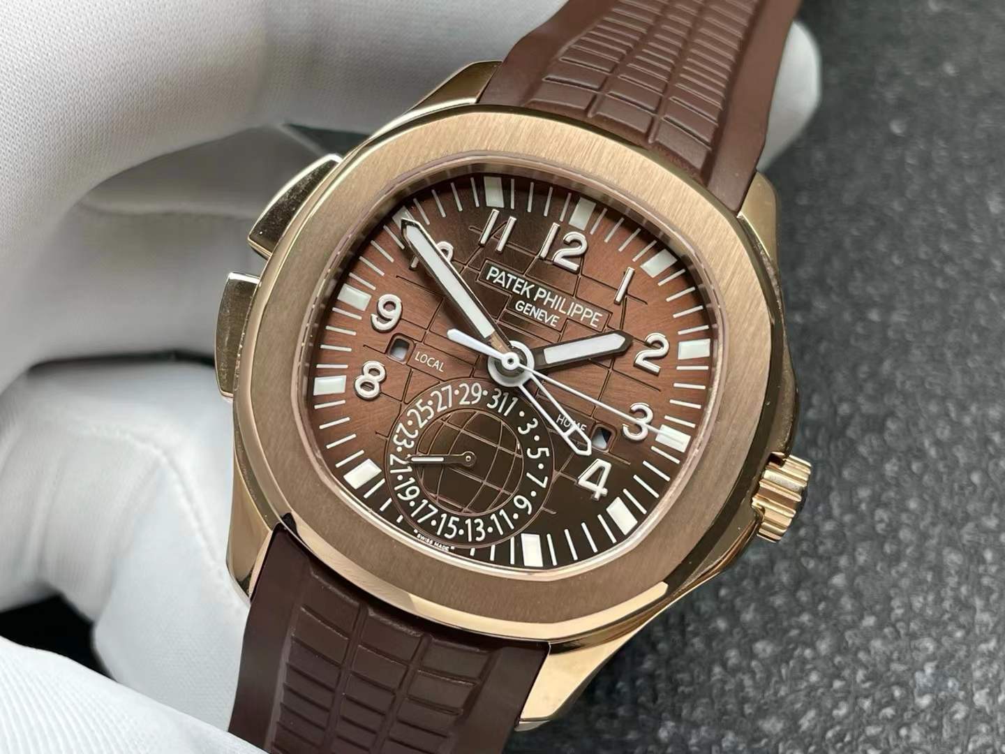 Patek Philippe Aquanaut Travel Time 5164R-001 watch in rose gold with a brown dial and a brown composite strap