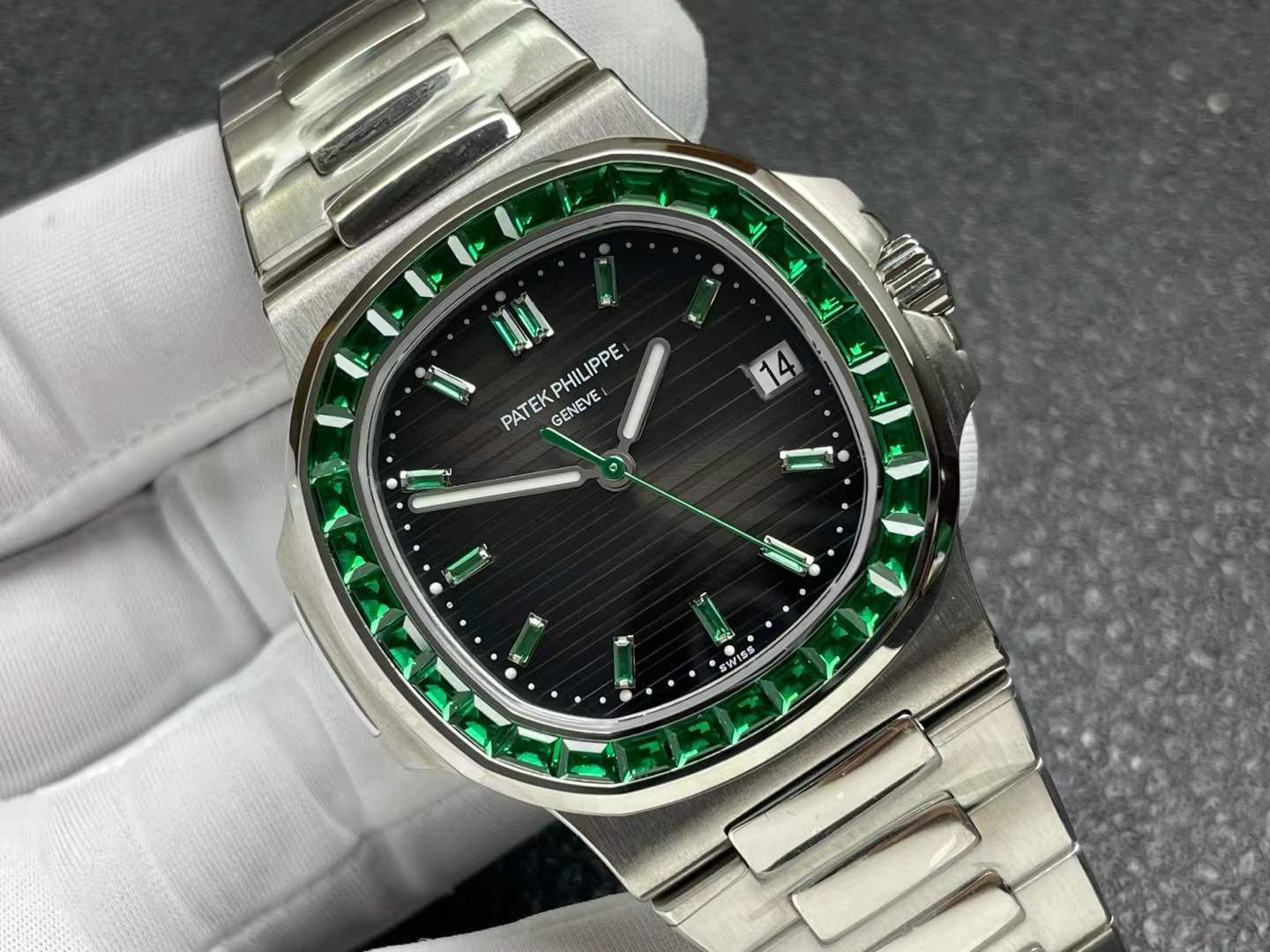 Patek Philippe 5711/113P Nautilus platinum watch with baguette-set emeralds