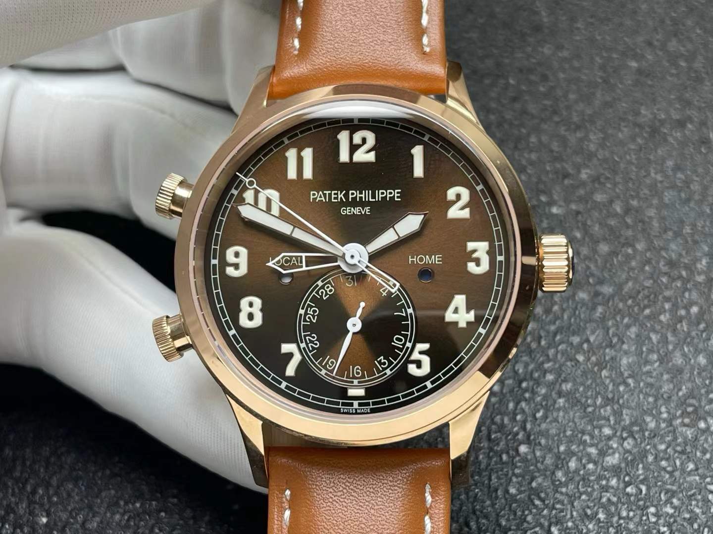 Patek Philippe Calatrava Pilot Travel Time watch in rose gold with a brown dial