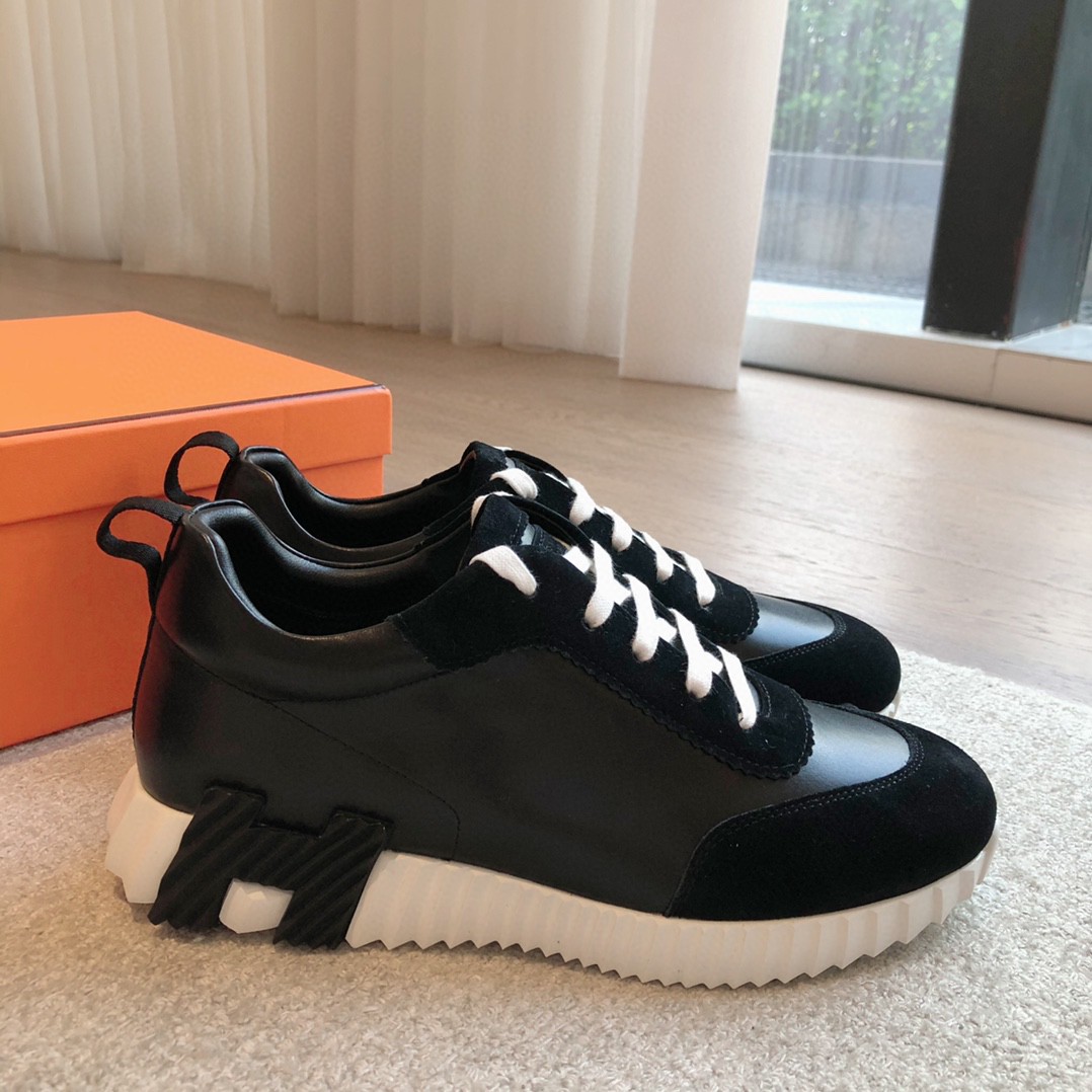 Hermès Bouncing sneakers in black leather and suede with a white rubber sole