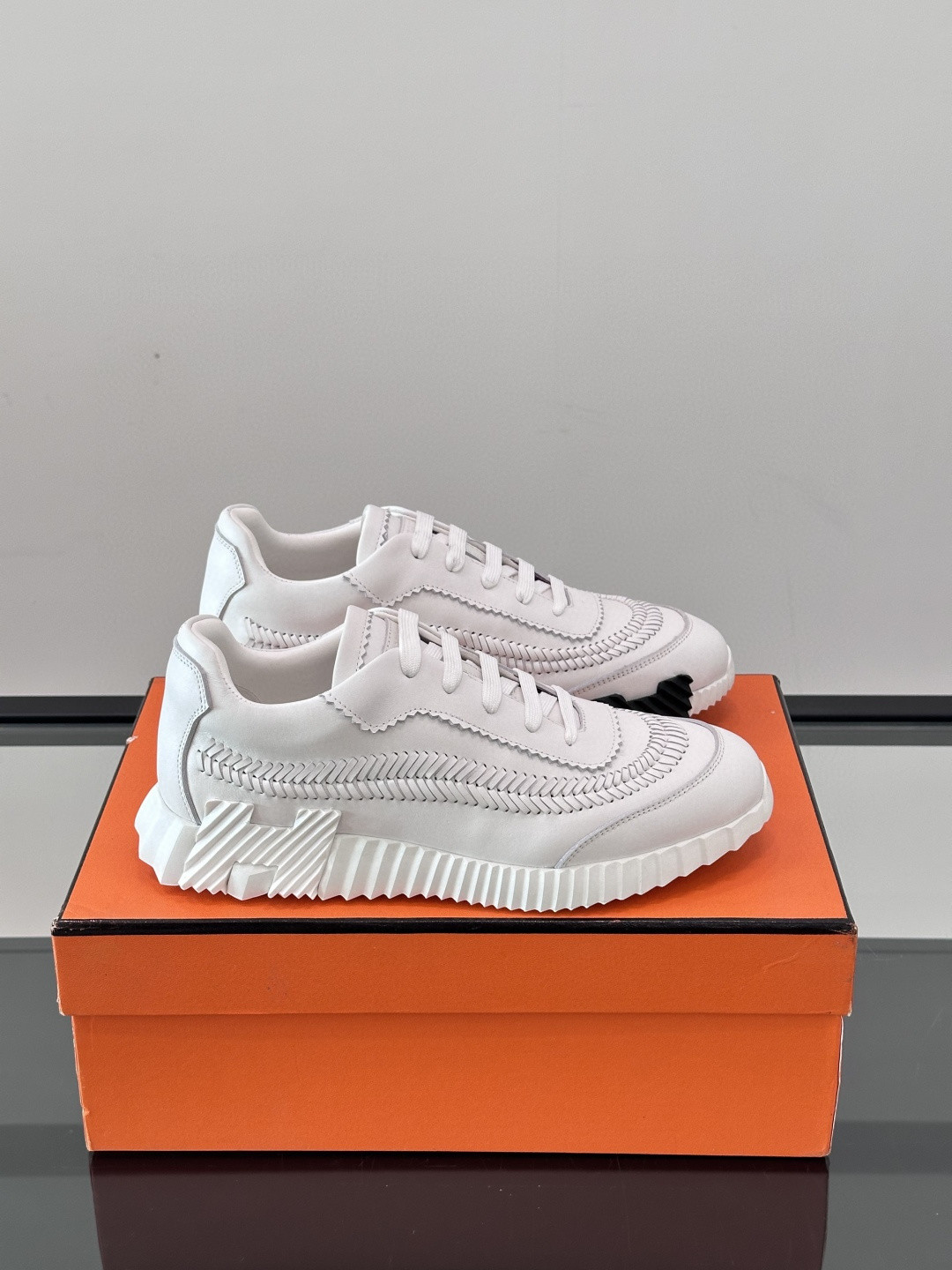 Hermès Bouncing sneakers in white leather and technical canvas