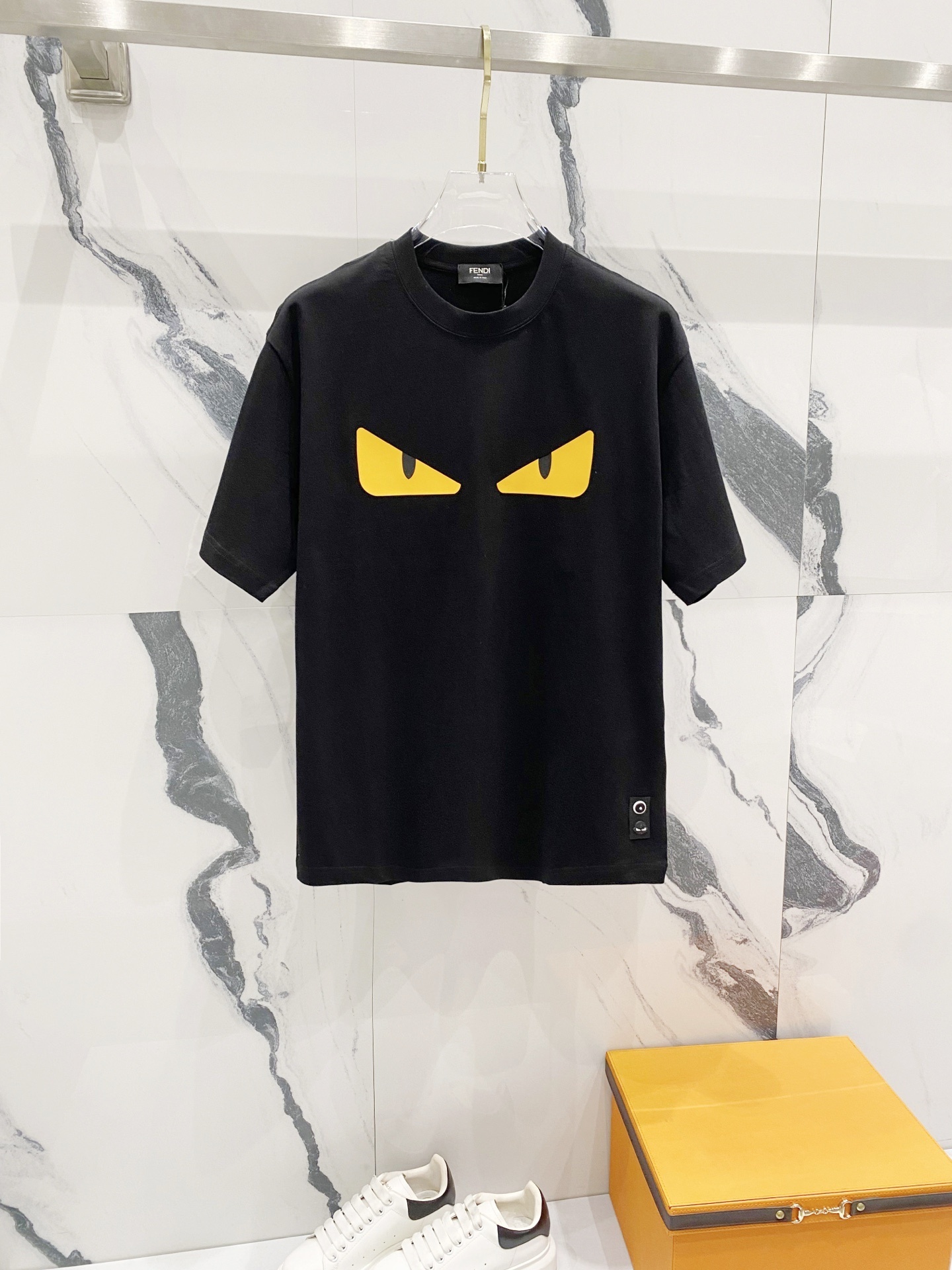 Fendi Monster Eyes graphic t-shirt in black cotton with yellow printed eyes.