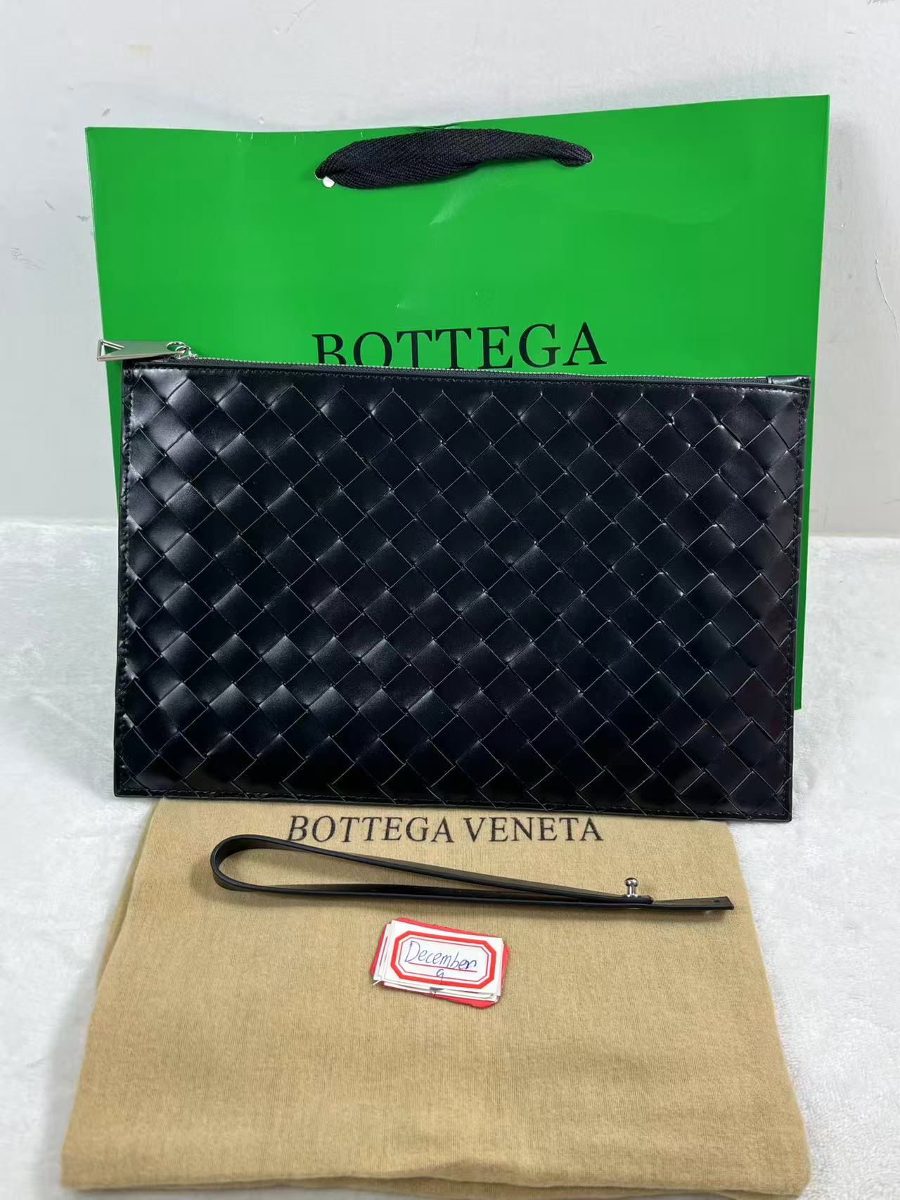 Bottega Veneta black leather clutch