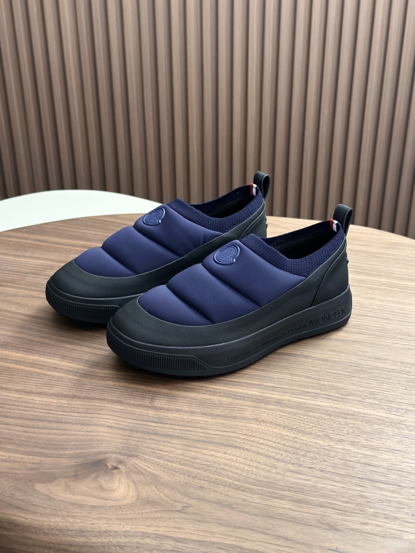 Moncler Altive slip-on sneaker in blue with a quilted nylon upper and a Vibram rubber sole