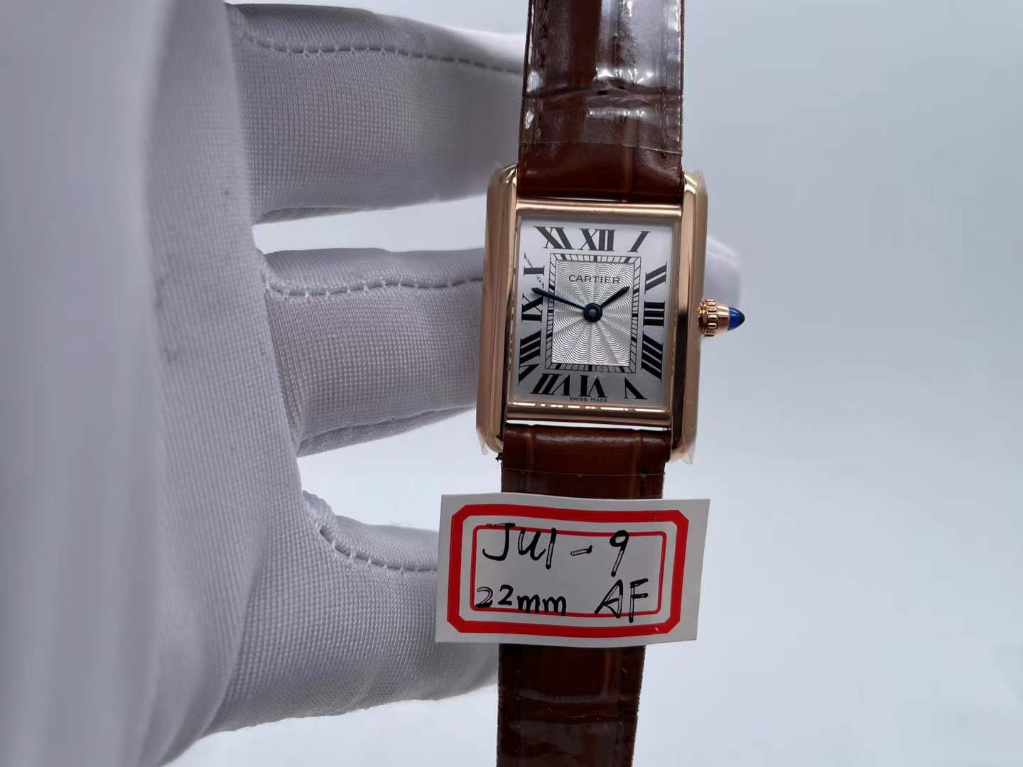 Cartier Tank Louis Cartier small model watch, reference number WGTA0010, in rose gold with a brown
