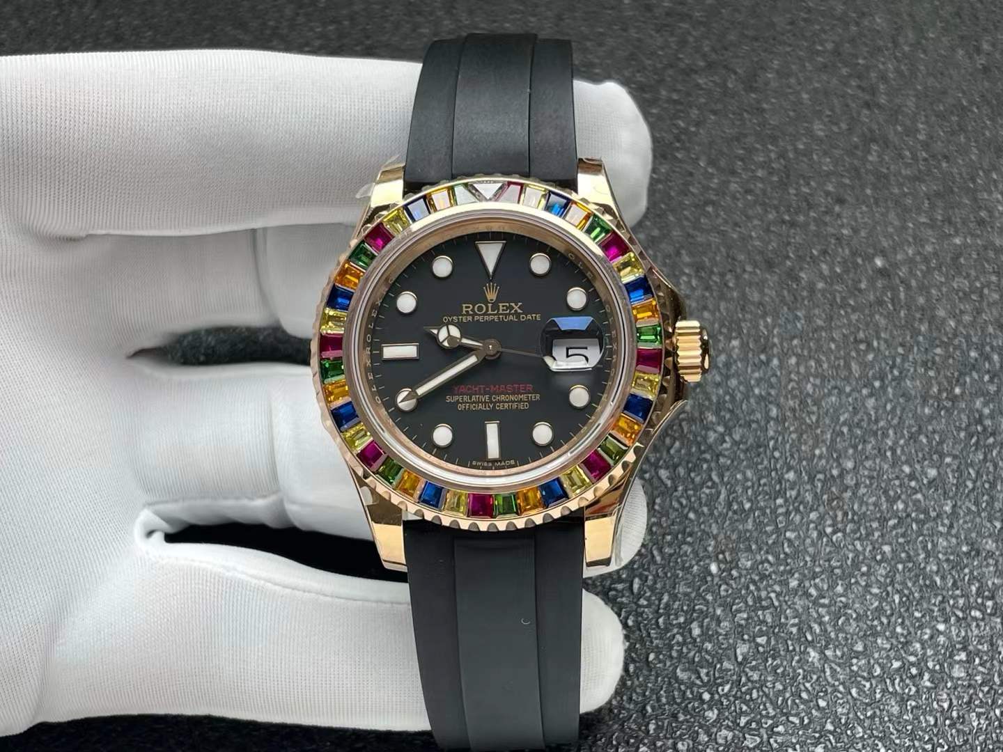 Yacht-Master 40 reference 116695SATS in 18k Everose gold with a black dial, rainbow bezel and black