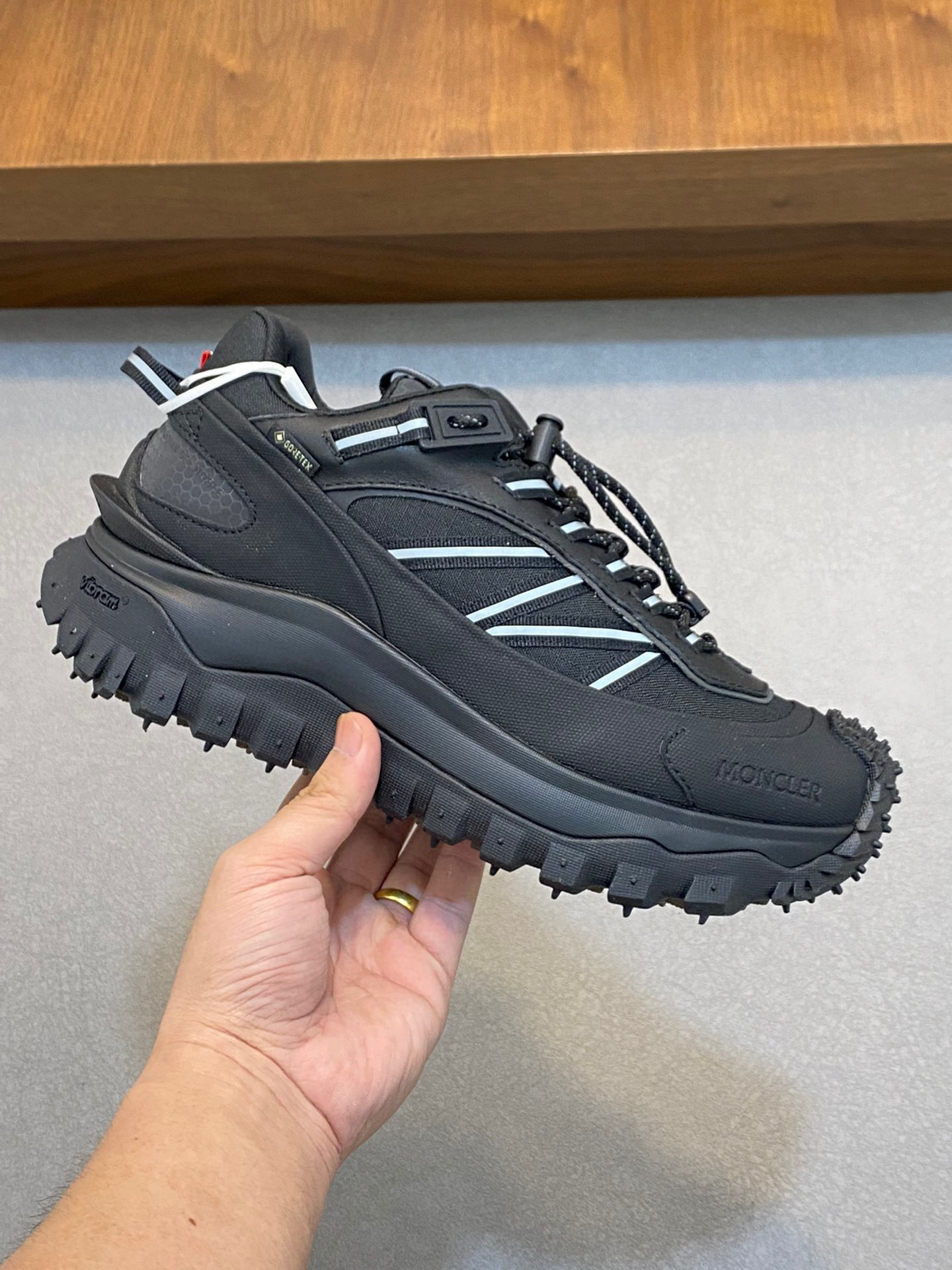 Moncler Trailgrip GTX low top sneaker in black with a Vibram Megagrip sole