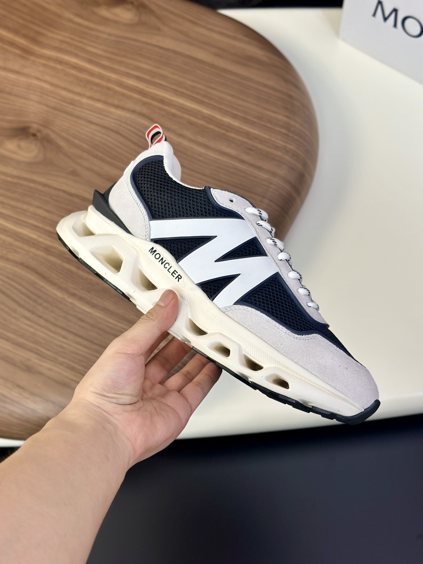 Moncler Pacey nylon and suede runner sneakers in milk white and navy blue.