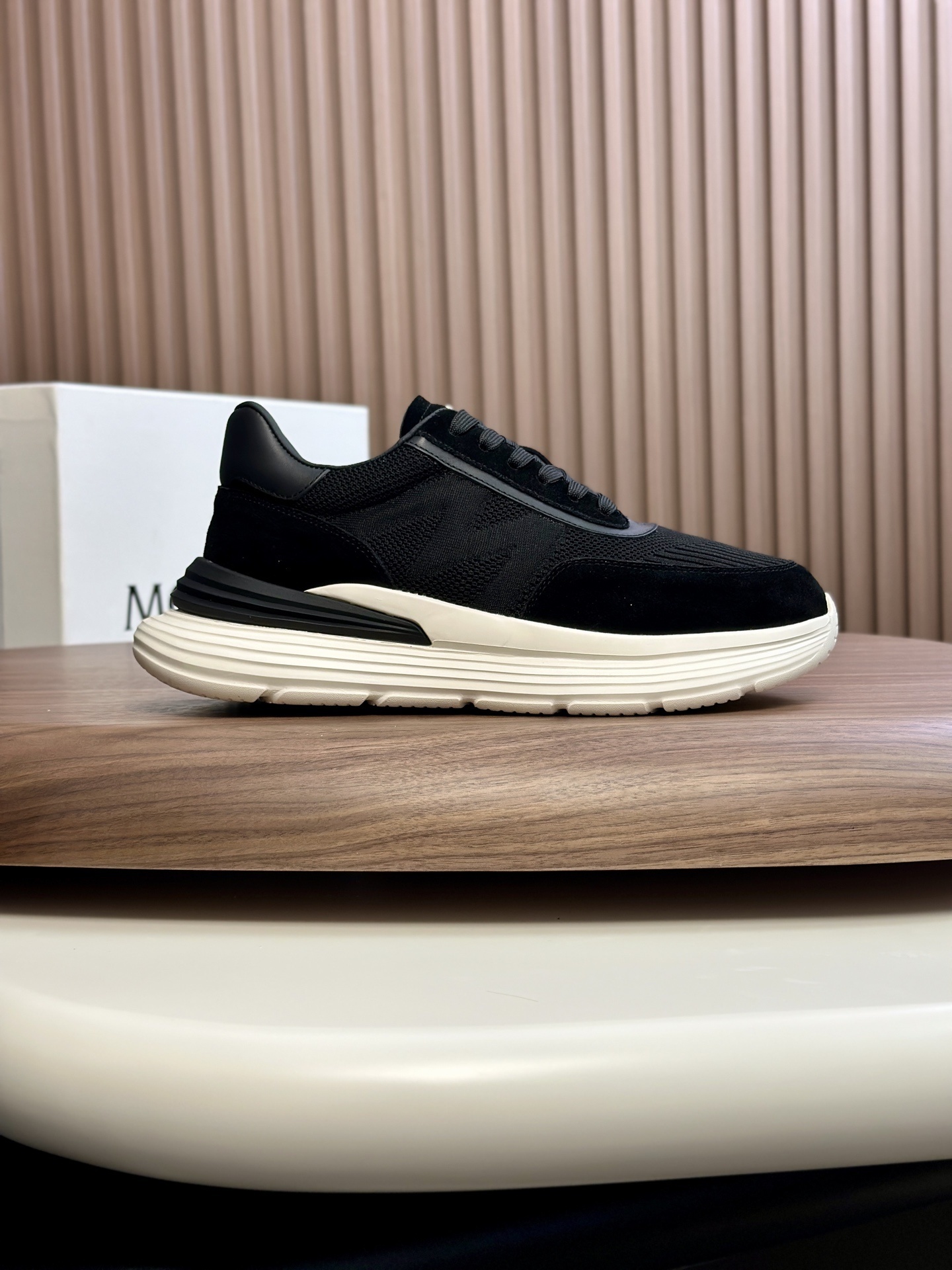 Moncler Monte Runner sneakers in black with a white midsole