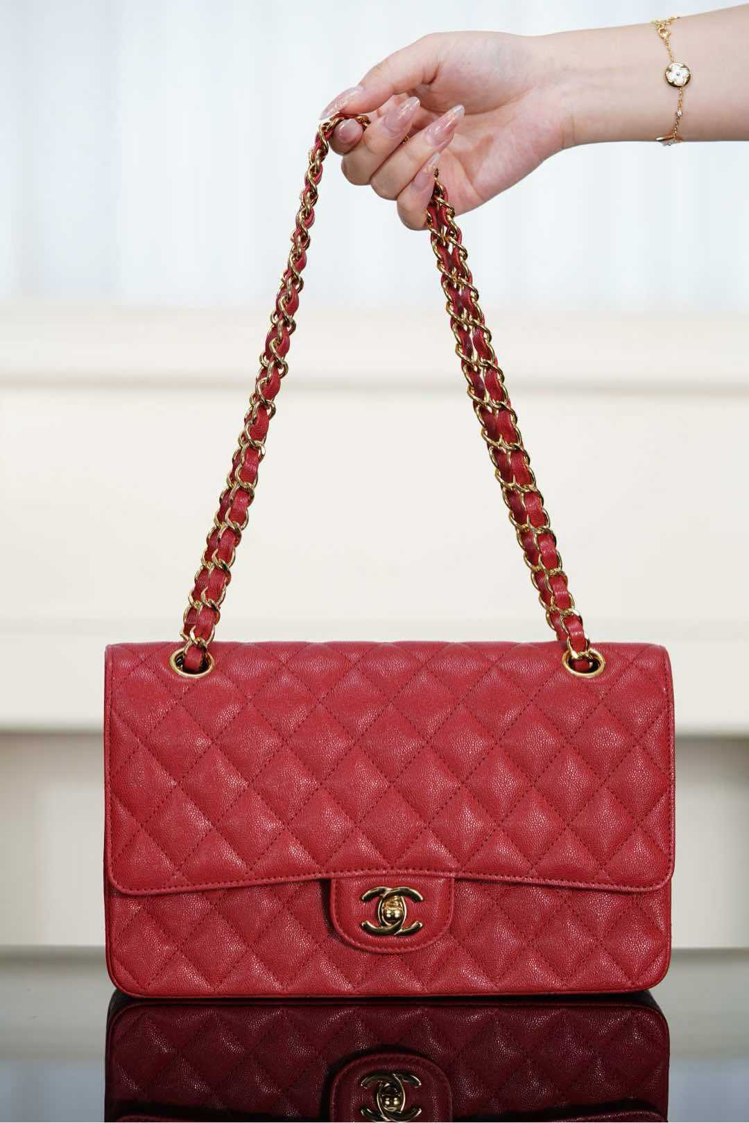 Chanel Medium Classic Double Flap bag in red caviar leather