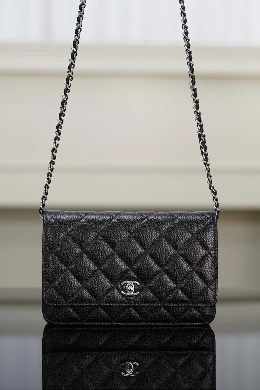 Chanel Classic Wallet on Chain (WOC) in black caviar leather with silver-tone hardware
