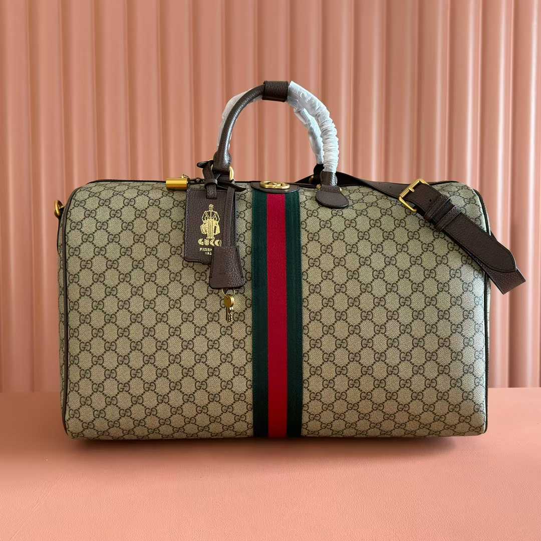 Gucci Savoy duffle bag in the GG Supreme canvas with the green and red Web stripe