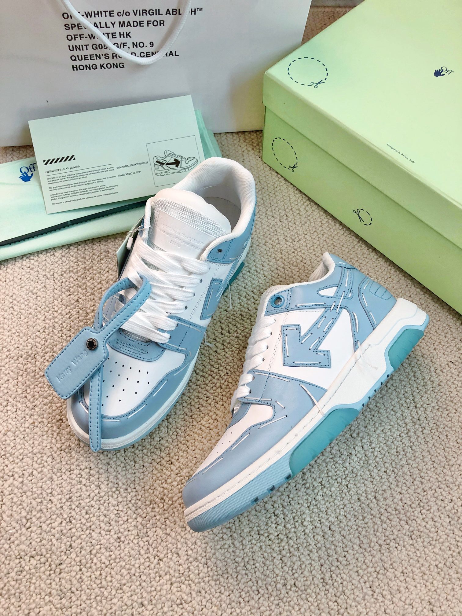 Off-White Out of Office "Ooo" low-top sneakers in a white and light blue