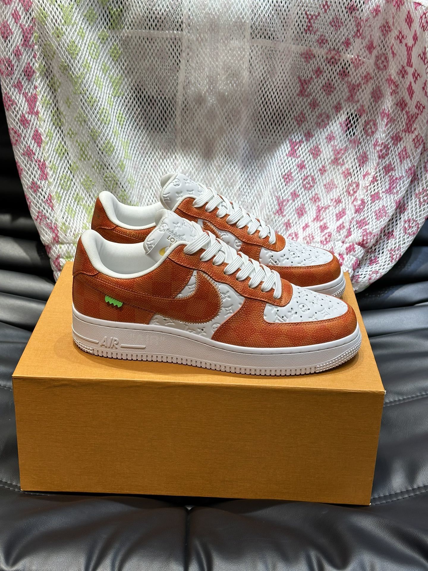 LV x Nike Air Force 1 Low in a white and orange
