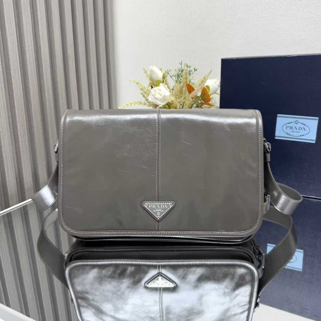 Prada leather messenger bag in grey