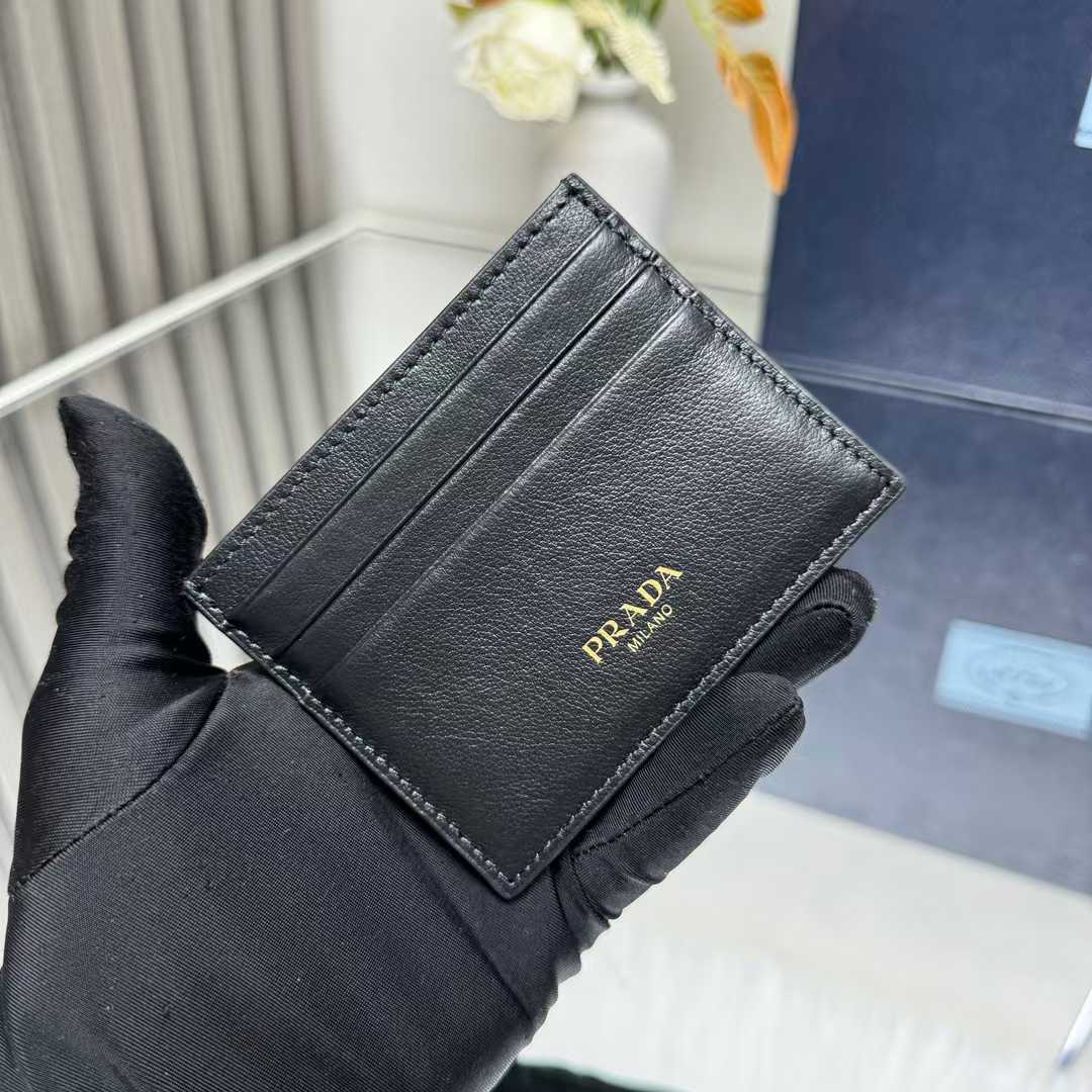 Prada logo-stamp leather card holder in black calf leather
