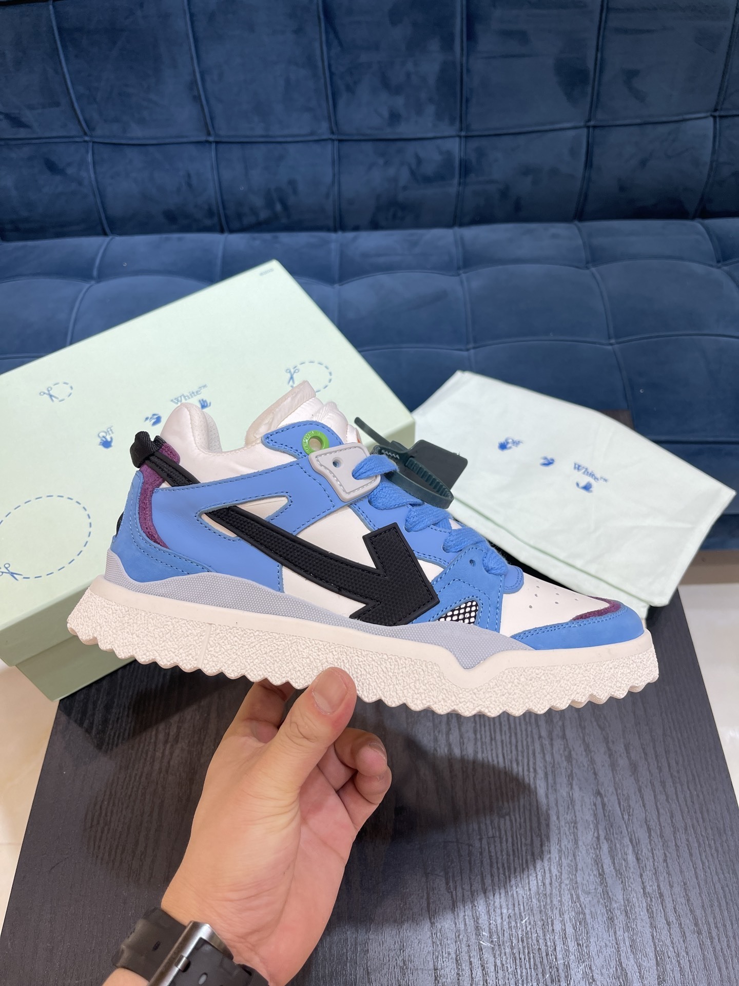 Off-White Sponge Mid Top Sneaker in a white and blue