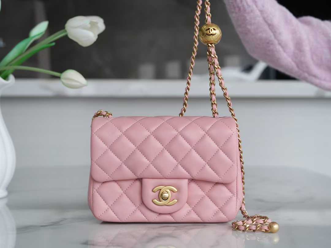 Chanel Mini Square Flap bag in pink lambskin leather with gold-tone hardware