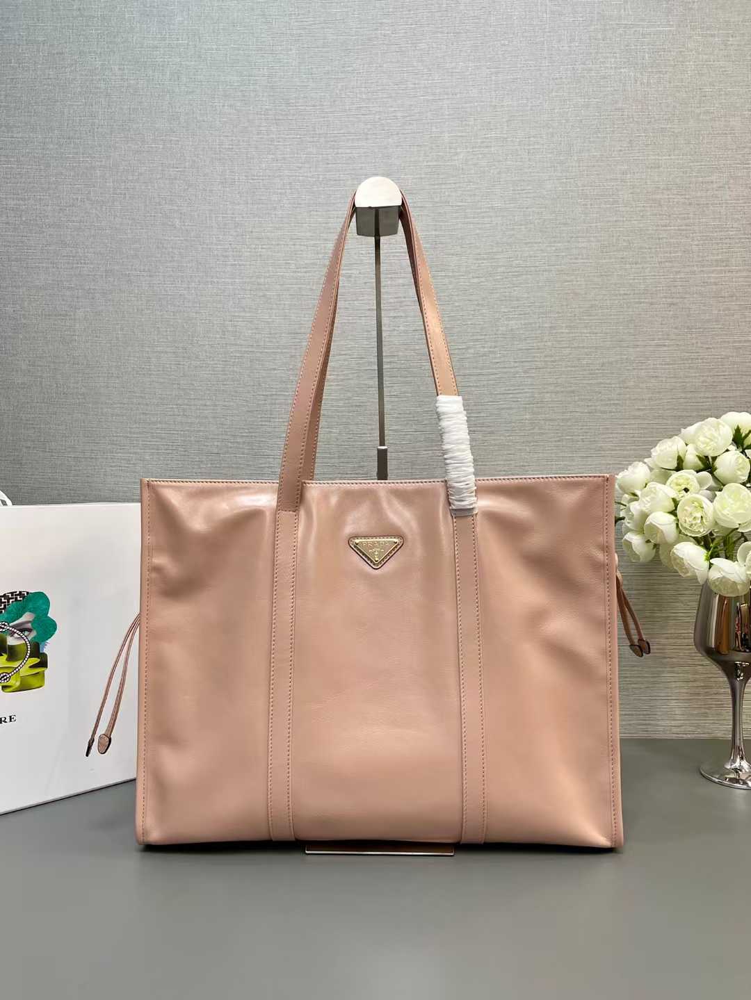 Prada large leather tote bag in a light pink color
