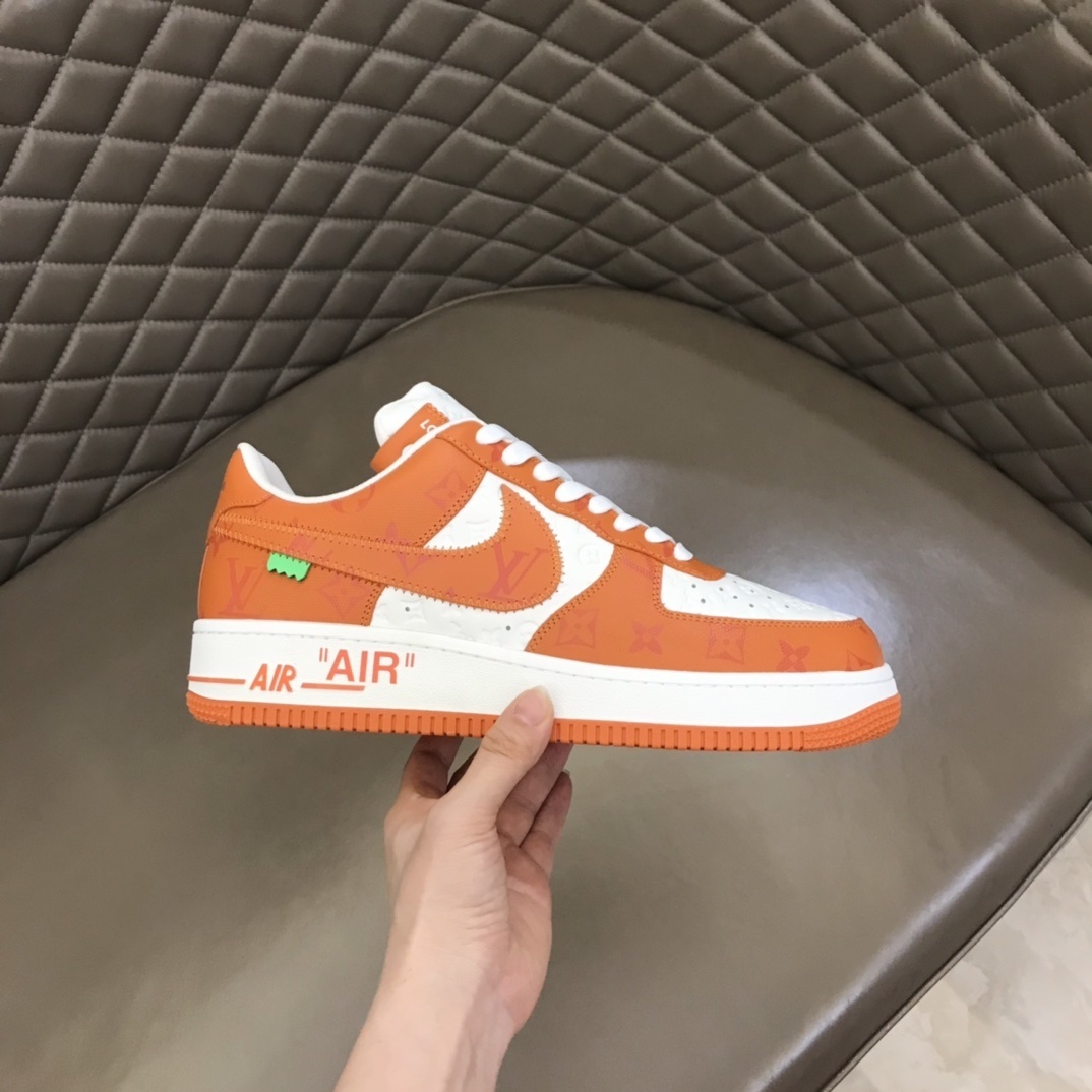 LV x Nike Air Force 1 Low in a white and orange colorwayNike Sneaker