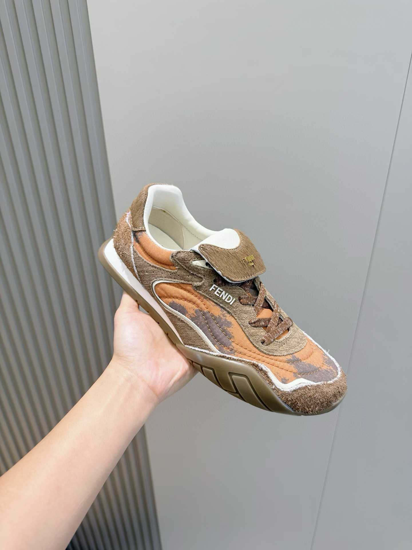 Fendi Wave Pulse low-top sneaker in a brown and orange colorway