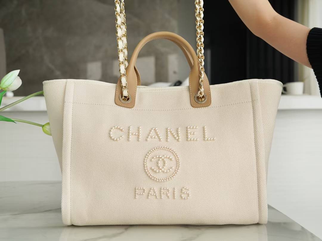 Chanel Deauville Pearl Embellished Tote bag in off-white canvas with tan calfskin trim