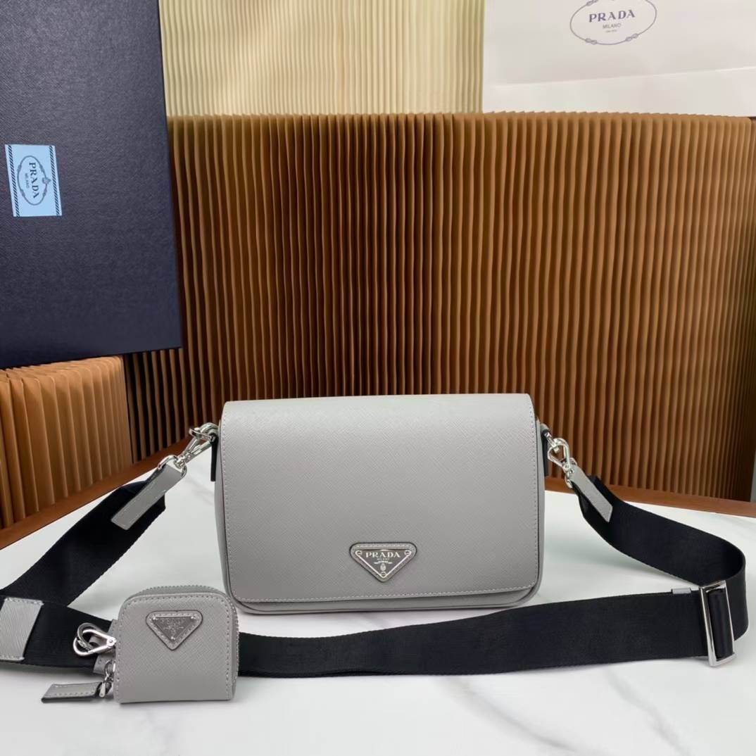 Prada Saffiano leather shoulder bag in a light gray/white color